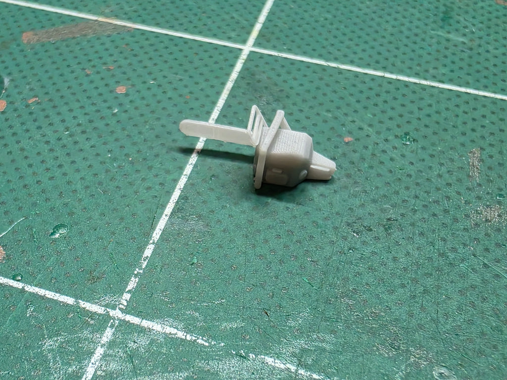 Motorsäge im Maßstab 1/50