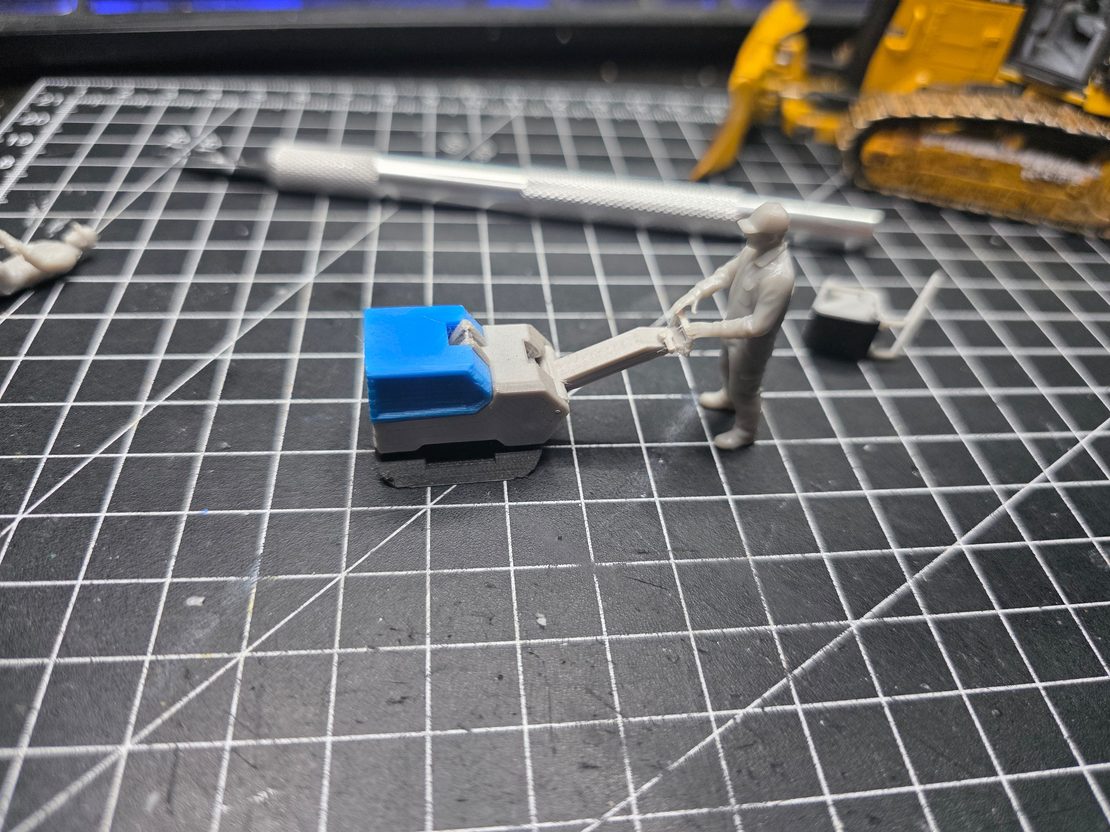 Rüttelplatten Fahrer/ Kleingeräte Bediener im Maßstab 1/50