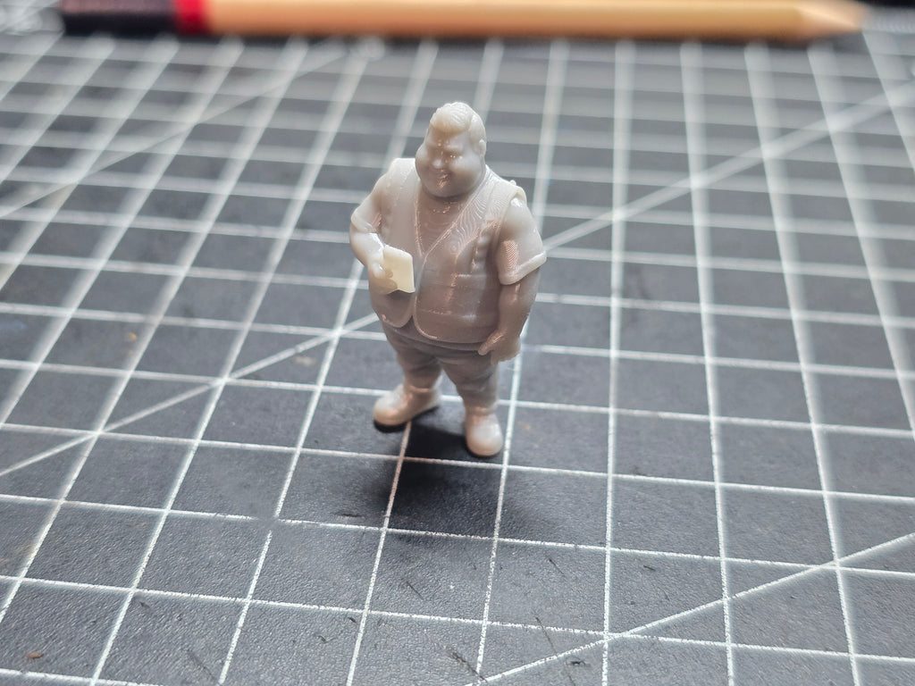 Bauleiter mit Telefon im Maßstab 1/50
