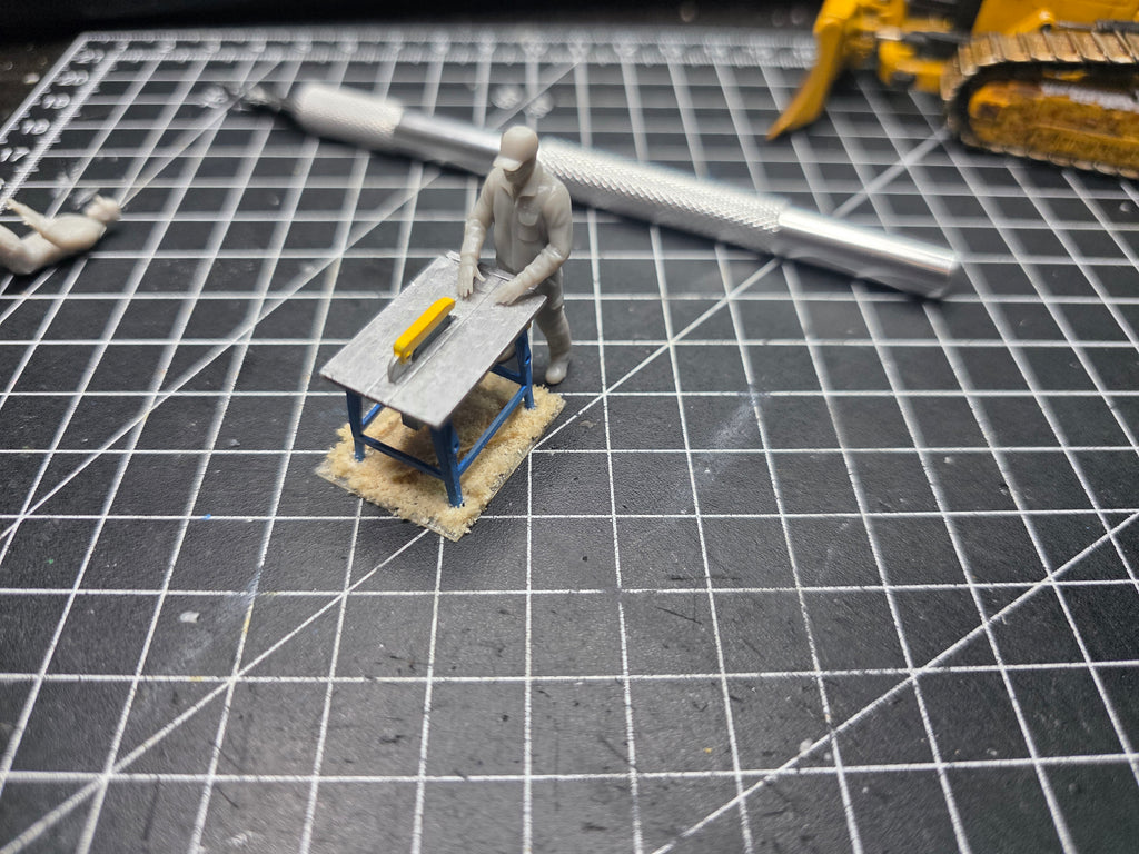 Rüttelplatten Fahrer/ Kleingeräte Bediener im Maßstab 1/50